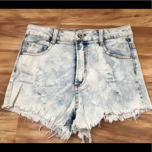 High rise distressed denim shorts